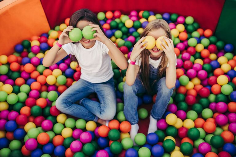 Children playing in a ball pit